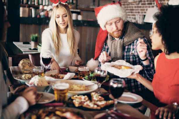 istock Friends having dinner at home at Christmas eve. 1051210964