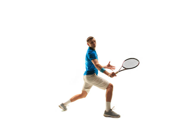 istock one caucasian man playing tennis player isolated on white background 1051215748