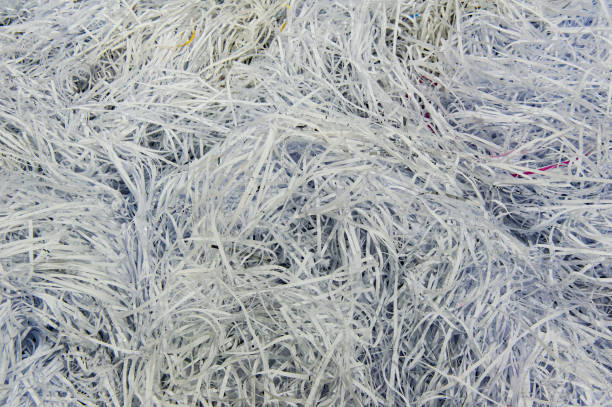 istock Use a shredder to dispose of discarded paper fragments 1051223270