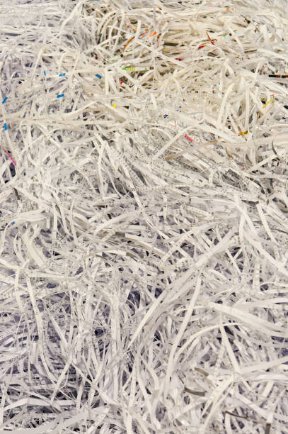 istock Use a shredder to dispose of discarded paper fragments 1051223312