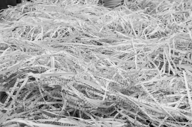 istock Use a shredder to dispose of discarded paper fragments 1051223332
