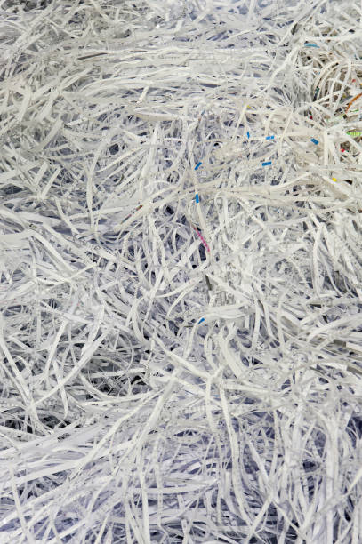 istock Use a shredder to dispose of discarded paper fragments 1051223350