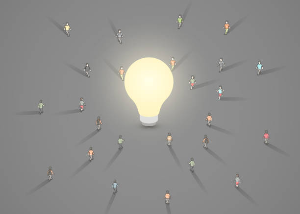 istock A group of people walking to a light bulb. Brainstorm, inspiration, idea business concept. 1051227220