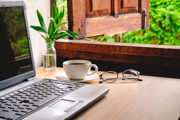 istock A cup of coffee on the table beside the window. 1051232588