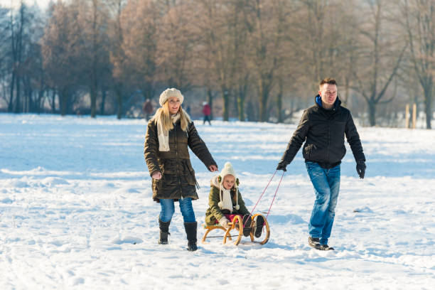 istock Family haveing fun on snow 1051233070