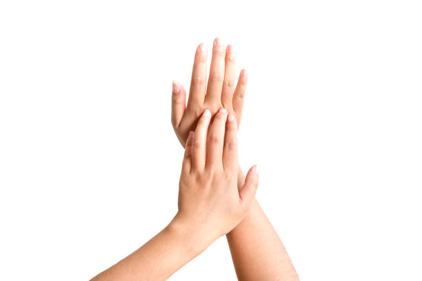 istock Closeup image of beautiful woman's hands isolate on white background.Girl hands with beautiful manicure 1051233578