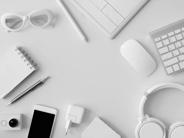 istock top view of office desk workspace with notebook, graphic tablet, smartphone and gadget on table background, graphic designer, Creative Designer concept. 1051243912