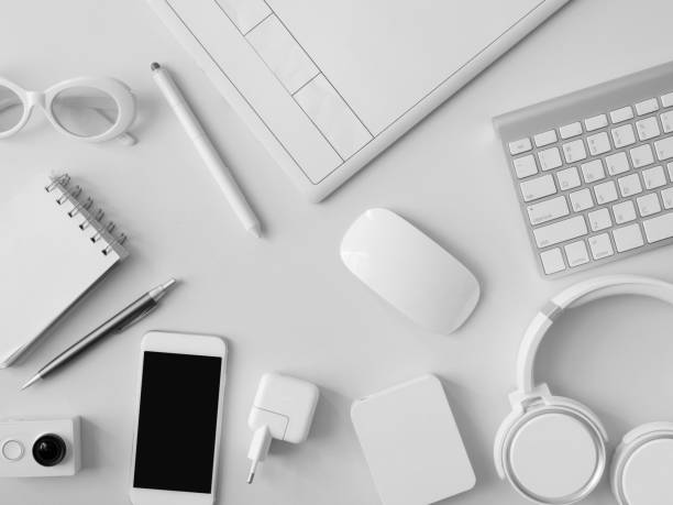 istock top view of office desk workspace with notebook, graphic tablet, smartphone and gadget on table background, graphic designer, Creative Designer concept. 1051243994
