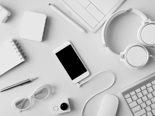 istock top view of office desk workspace with notebook, graphic tablet, smartphone and gadget on table background, graphic designer, Creative Designer concept. 1051243996
