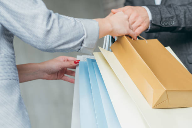 istock shopping addict spending lifestyle woman purchase 1051247334