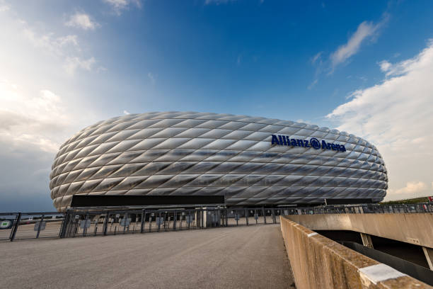 Allianz Arena - Football Stadium - Munich Germany Munich, Germany - September 7th, 2018: Allianz Arena (Fussball Arena Munchen, Schlauchboot), the home football stadium for FC Bayern Munich. Widely known for its exterior of inflated ETFE plastic panels, it is the first stadium in the world with a full colour changing exterior. Since 2012 the museum of Bayern Munich, FC Bayern Erlebniswelt, has been located inside the Allianz Arena. allianz arena stock pictures, royalty-free photos & images