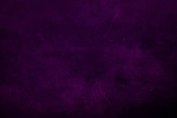 istock DArk purple  grungy canvas background or texture with dark vignette borders 1051247644