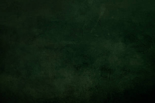 istock DArkgreen  grungy canvas background or texture with dark vignette borders 1051247662