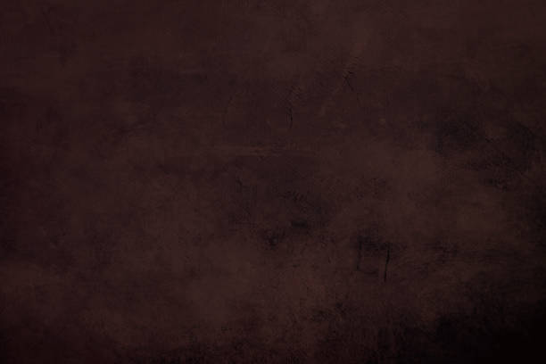 istock Brown grungy canvas background or texture with dark vignette borders 1051247666