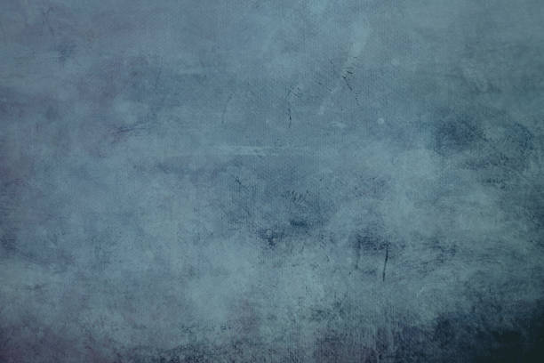 istock bluegrungy canvas background or texture with dark vignette borders 1051247676