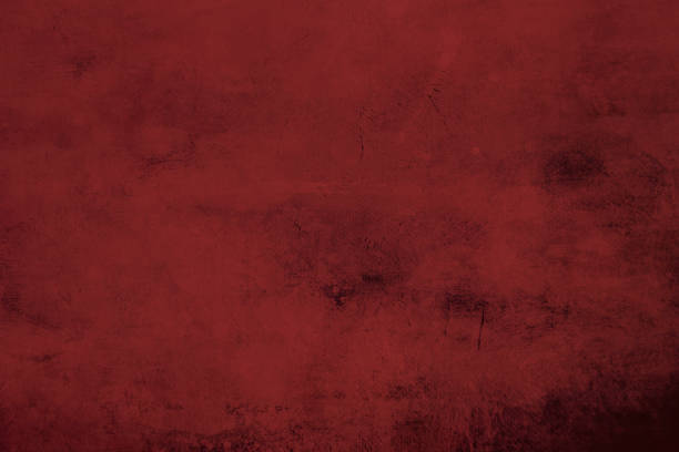 istock Red grungy canvas background or texture with dark vignette borders 1051247682