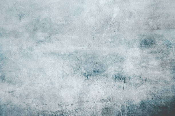 istock Pale blue grungy canvas background or texture with dark vignette borders 1051247690