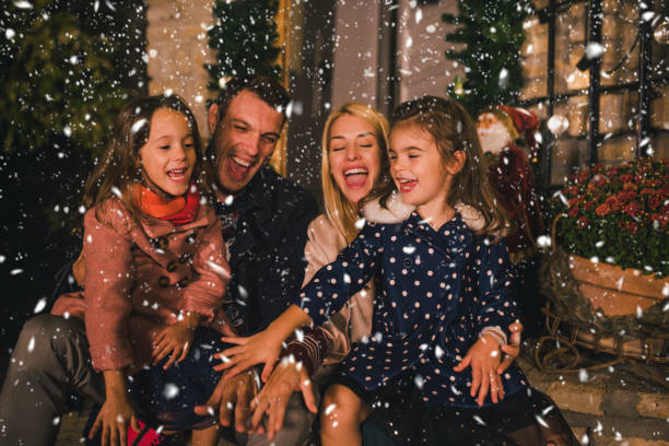 istock Young family hugging and smiling 1051255056