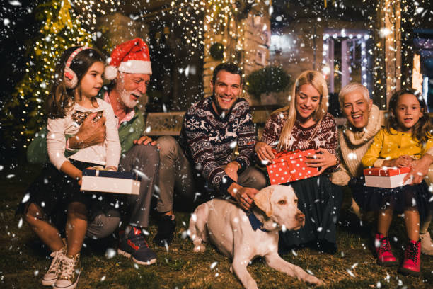 istock Family holding Christmas presents 1051255142