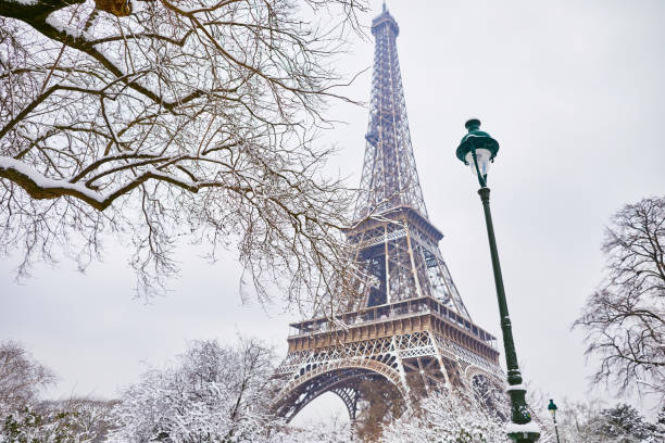 istock Scenic view to the Eiffel tower on a day with heavy snow 1051258692