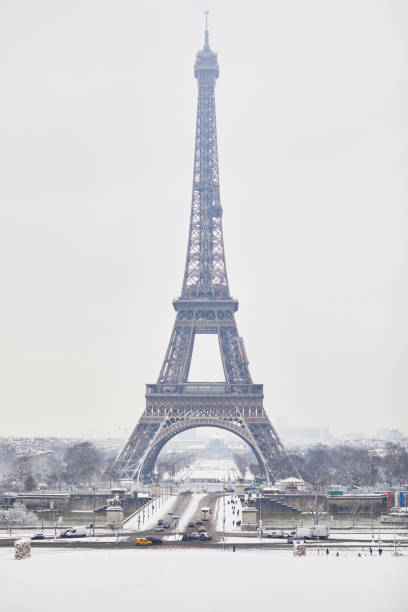 istock Scenic view to the Eiffel tower on a day with heavy snow 1051258724