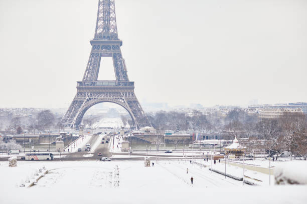 istock Scenic view to the Eiffel tower on a day with heavy snow 1051258850