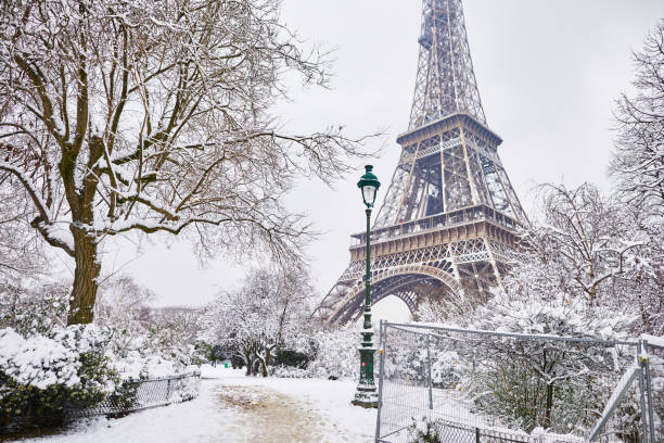 istock Scenic view to the Eiffel tower on a day with heavy snow 1051258890