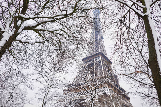 istock Scenic view to the Eiffel tower on a day with heavy snow 1051258968