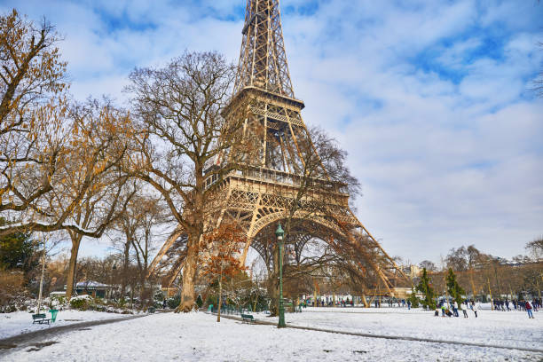 istock Scenic view to the Eiffel tower on a day with heavy snow 1051258970