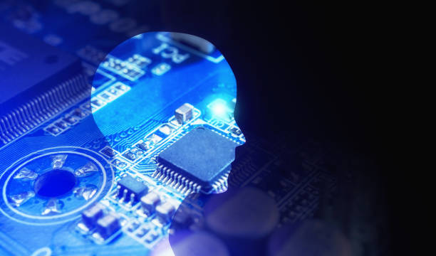 istock Side view of human head shape and motherboard. Model isolated on blue background, artificial intelligence in digital futuristic computer technology concept, 3d illustration 1051258974