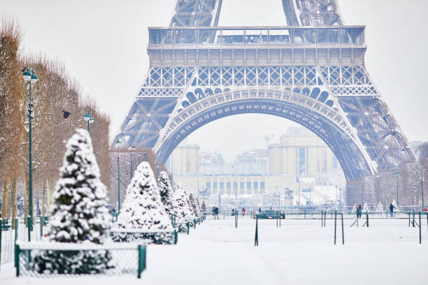 istock Scenic view to the Eiffel tower on a day with heavy snow 1051259014