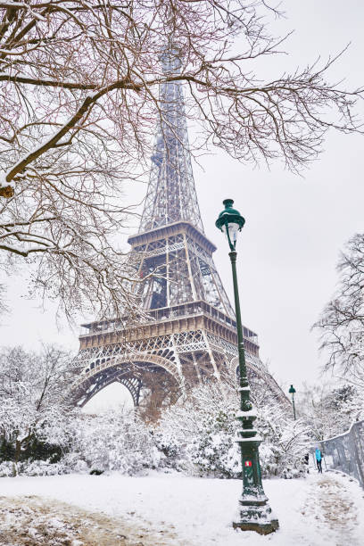 istock Scenic view to the Eiffel tower on a day with heavy snow 1051259024