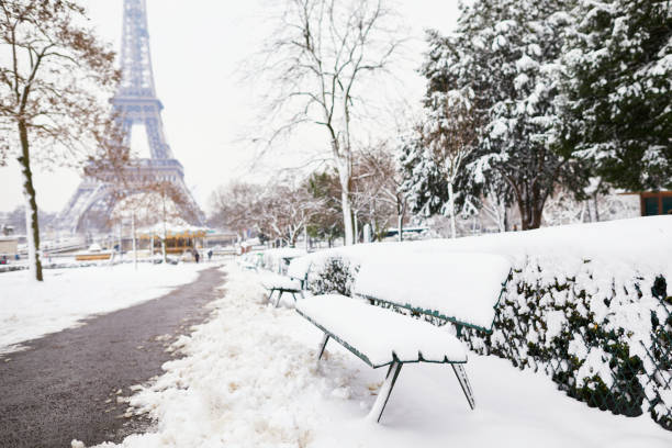istock Scenic view to the Eiffel tower on a day with heavy snow 1051259032