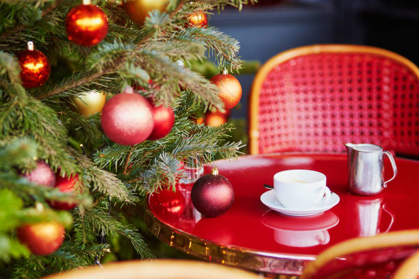 istock Outdoor Parisian cafe with beautiful Christmas tree 1051259350