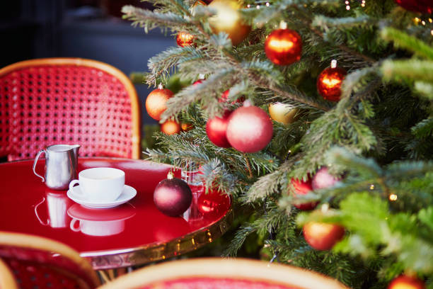 istock Outdoor Parisian cafe with beautiful Christmas tree 1051259368