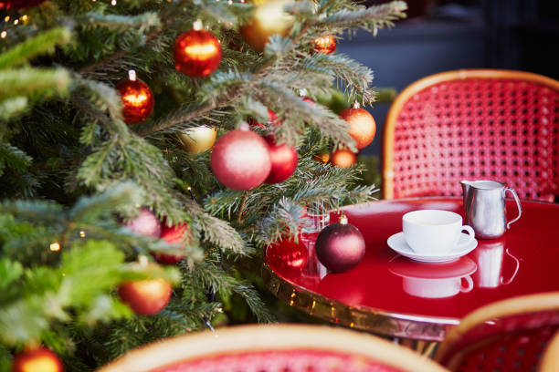 Outdoor Parisian cafe with beautiful Christmas tree