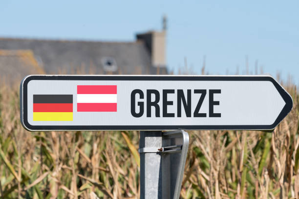 istock A sign indicates the border between Germany and Austria 1051263562