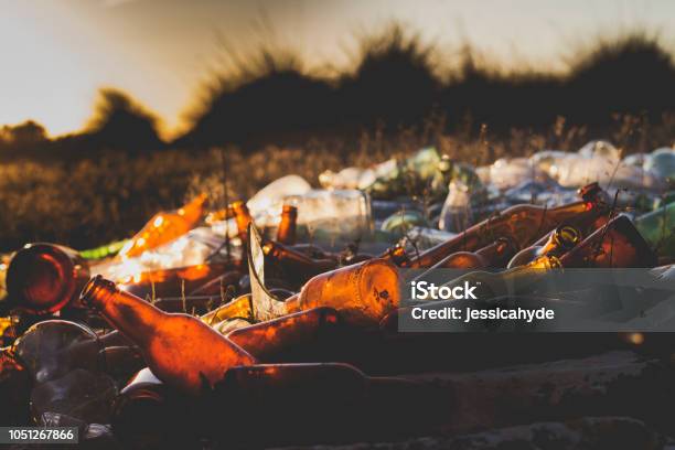 Pile Of Glass Bottles Waste Stock Photo - Download Image Now - Bottle, Garbage, Glass - Material
