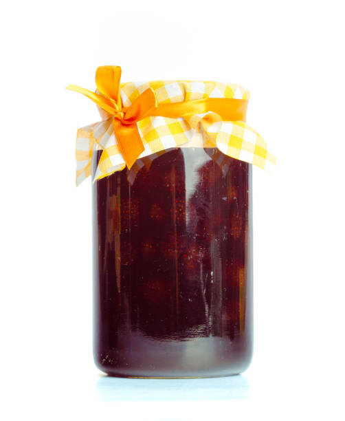 istock Glass jar with  jam isolated on the white background 1051271622