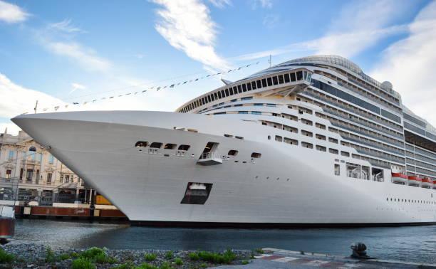 istock Low Angle View Of Cruise Ship Moored On Sea Against Sky 1051283152
