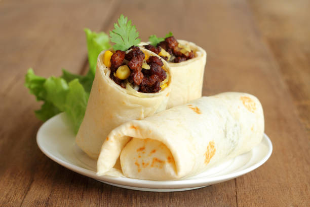 istock Burritos wraps with minced pork and vegetables. 1051293164