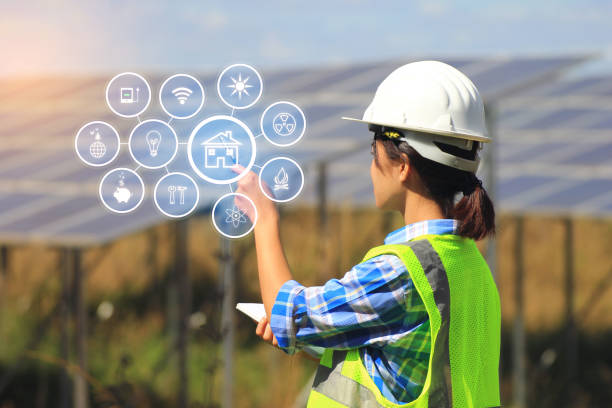 istock young woman engineer checking solar panel with hologram at solar power plant 1051293398
