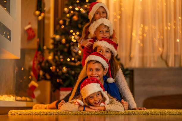 istock The tower of children at Christmas tree 1051293964