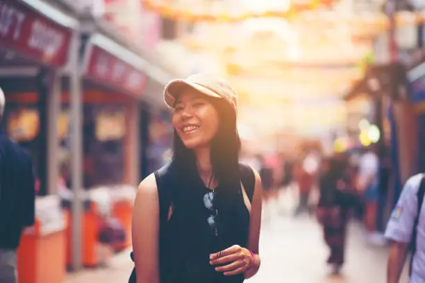 Photo of Asian travelers in Bugis Street Market, Singapore