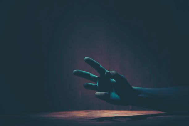 istock Green hand of the ghost on Halloween 1051295010