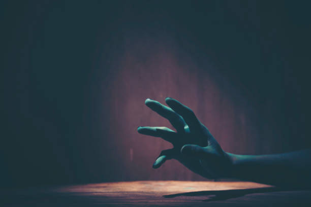 istock Halloween Hand concept, dark and black vintage tone 1051299100
