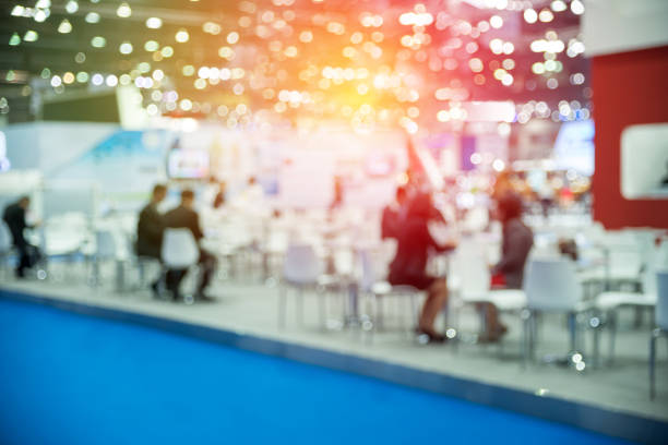 istock Defocused Image Of People Sitting At Poolside 1051302840