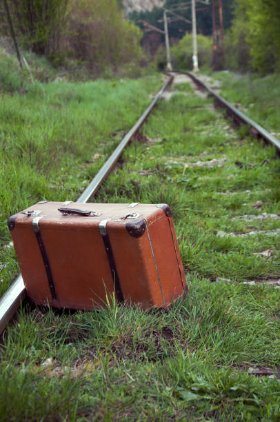 istock old suitcase of clothes 1051302924