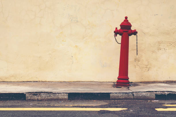 istock red street water valve or red fire hydrant ( emergency concept ) 1051304000