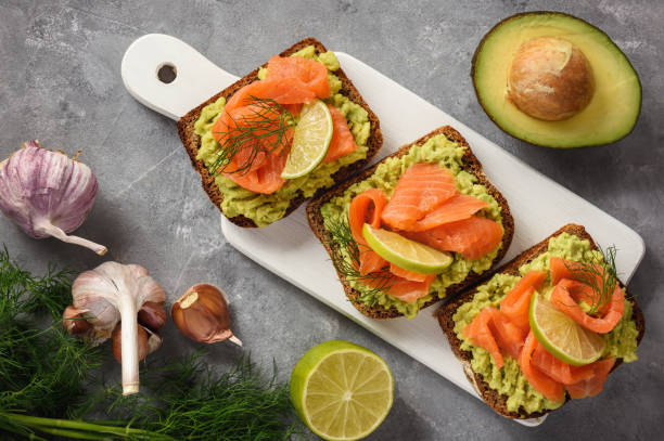 istock Sandwiches with avocado spread and smoked salmon. 1051313530